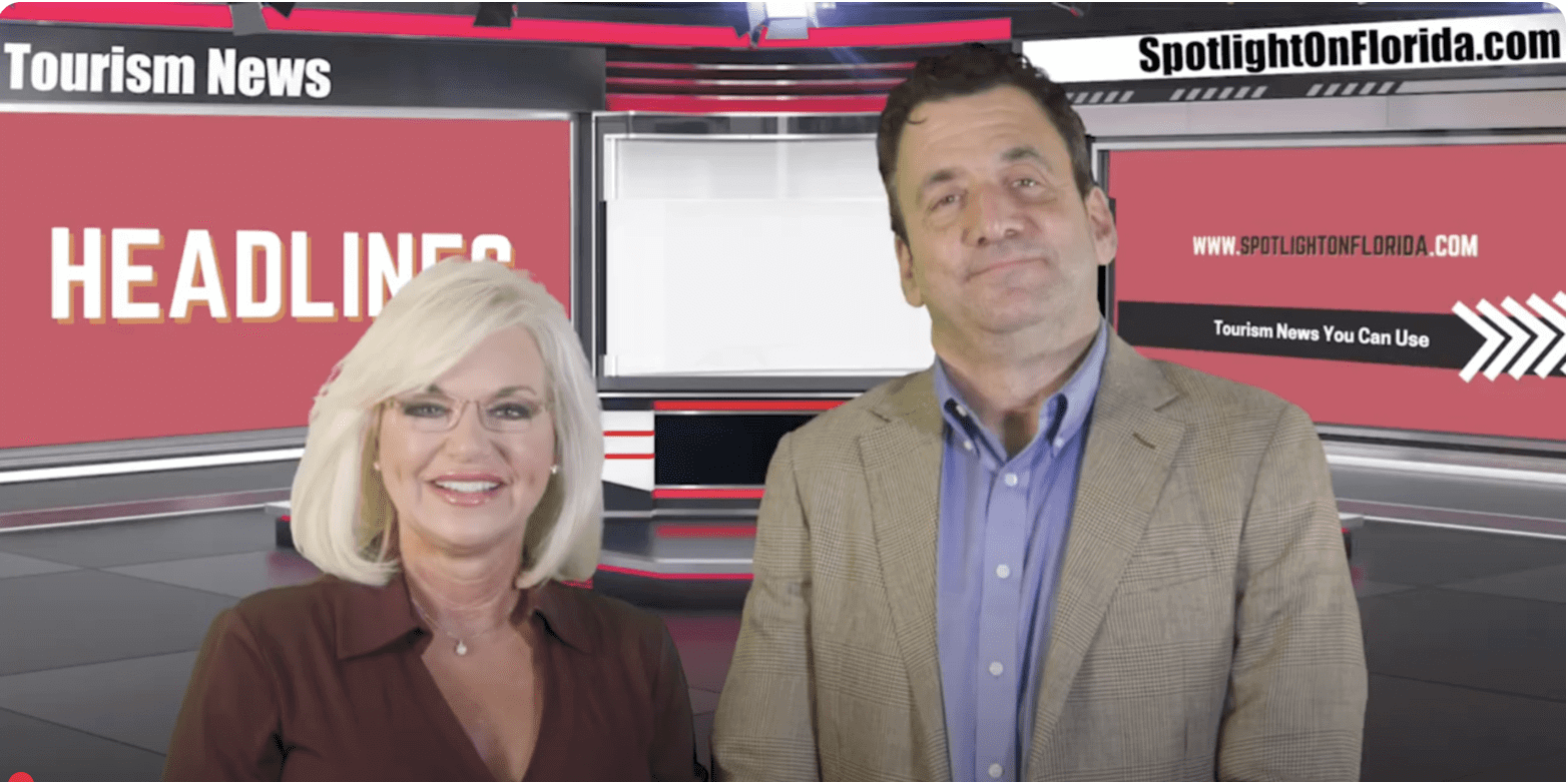 Two people in a news studio.